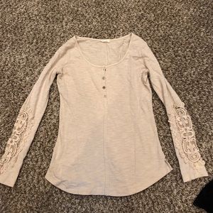 Cream Henley top with crochet detail sleeve